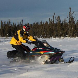 Me having fun last year. i am riding a Polaris rmk trail. my wife has one too but no pics of her on it yet.