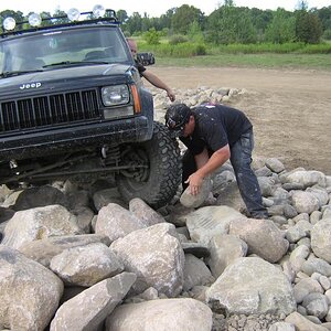 Billy D stacking rocks