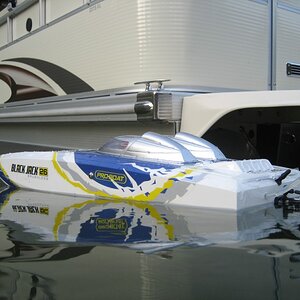 My Blackjack 26. This boat is a blast to drive. 38mph confirmed by pontoon boat driving next to it.