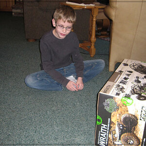 In awe of his newly acquired r/c. Hanlon got Axial Wraith for his 9th birthday.