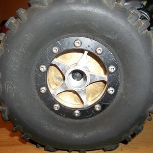 It has custom aluminum wheels with delrin bead locks. The front wheels have brass weight inserts.