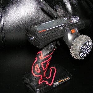 Custom Flysky GT3B RX/TX. Has a Losi Boss Claw tire mod, carbon fiber wrap and St Louis Cardinals decal. (GO CARDS!)