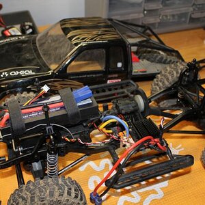 Pretty much stock SCX-10.  The ESC is mounted on a bracket made by AJS Machine, and I have Vanquish Products aluminum body mounts.