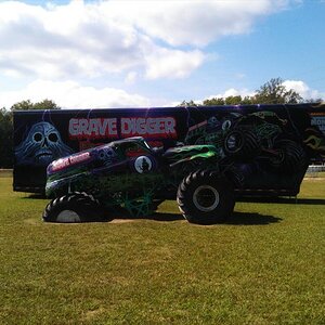 this truck isn't too old. my guess is early 2000's grave digger version ???