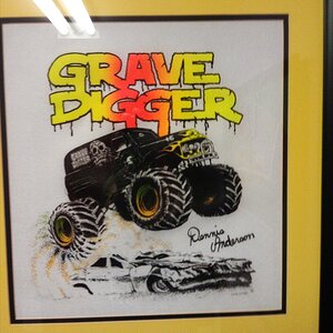 Retro Grave Digger shirt framed in the bathroom.