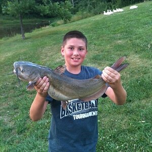 A boy and a fish.