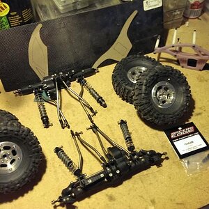 both axles have the RC4WD gears and big bearing kits but I think I'm going to leave the knuckles and c-hubs stock for now . the shocks are stock alumi