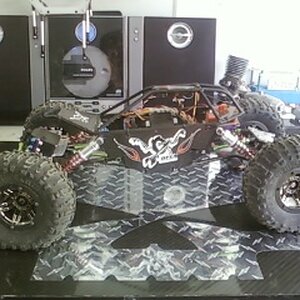 Axial scorp with TCS edge chassis * Novak goat bl * Dna dig * HR hubs, c's, lock outs * DNA cfx link mounts * 3 racing shocks * Hitec 7955 servo