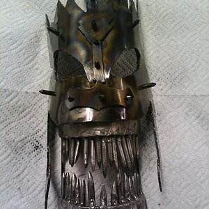 mask I made for Halloween a few years back
it fits your head fine but is kind of heavy to wear for extended amounts of time