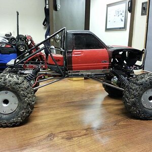 The Beast- Bully axles, 2ea axial 27ts, TI links, Metal Roll Cage.