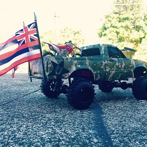 This was for a Big annual truck cruise so I had a couple Hawaiian flags and a dirtbike tied down. Also that's a "Udown" clothing brand sticker