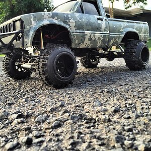 Digital camo duckt tape custom rims and lifted a lot