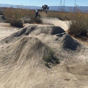 This was me and my son doing jumps together for the first time. I was driving the X-Maxx and Aidan was driving the Yeti XL.