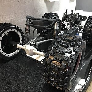 Axial Yeti XL with Pro-line Badlands Tires MX43 with Impulse Pro-Loc Wheels. These are only sitting on here. Not installed.