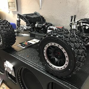 Axial Yeti XL with Pro-line Badlands Tires MX43 with Impulse Pro-Loc Wheels. These are only sitting on here. Not installed.