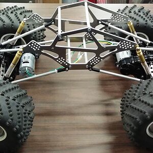 Clod Axles on Custom Crawlerz PRO Crawler Frame Plates with 4" spacers.  (12" wheelbase) (aboveside)