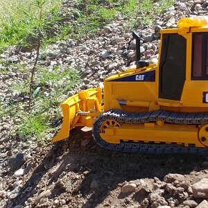 Custom Crawlerz Bruder D5 Dozer Conversion (left)