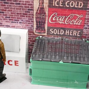 Dumpster and icebox in front of brick sheet. 7 inch action figure, Note: items shown are shrink-wrapped in prep for shipping to customer