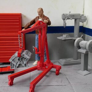 Picture shows radiator, tool box, creeper, engine hoist with short-block, stand-up drill press, and grinder , all these items available at www.hobbybu