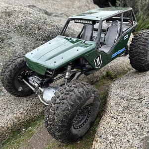 Ditched aluminum body panels for Axial clear body panels, replaced light bar with GearHead RC  Terra Torch 3” LED light bar. Upgraded Reefs RC Triple5