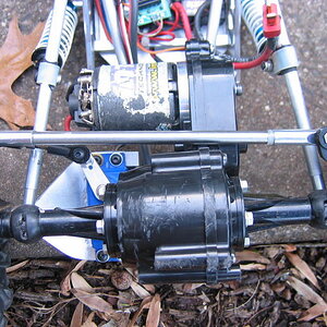 BTA steering detail. I'd like to have an even longer servo arm-- may have to fab an extension up. This Traxxas servo has been replaced by a Futaba 915