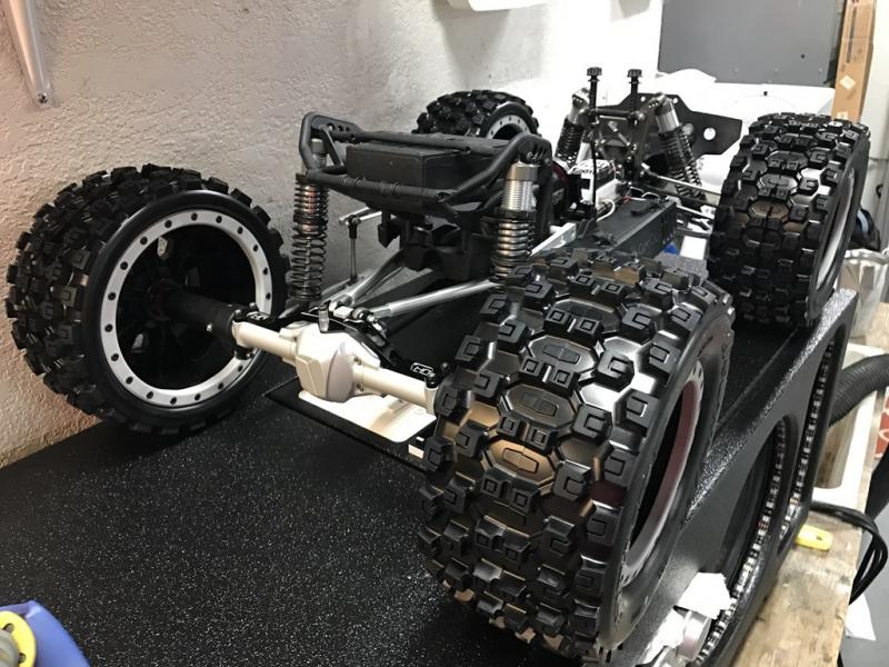 Axial Yeti XL with Pro-line Badlands Tires MX43 with Impulse Pro-Loc Wheels. These are only sitting on here. Not installed.