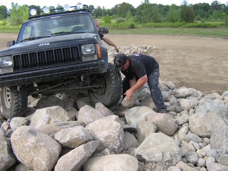 Billy D stacking rocks