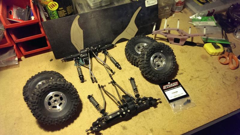 both axles have the RC4WD gears and big bearing kits but I think I'm going to leave the knuckles and c-hubs stock for now . the shocks are stock alumi