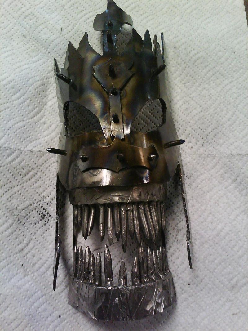 mask I made for Halloween a few years back
it fits your head fine but is kind of heavy to wear for extended amounts of time