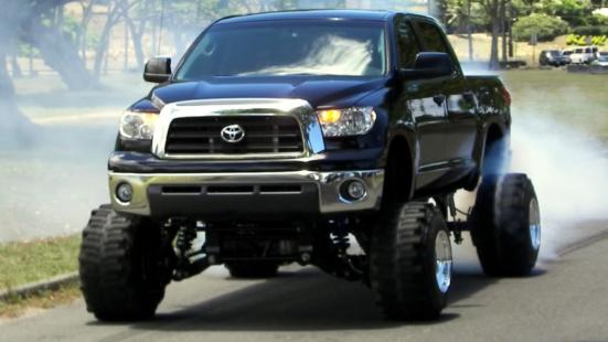 My uncles old 16" lift super charged tundra on realz and  boggers laying down rubber