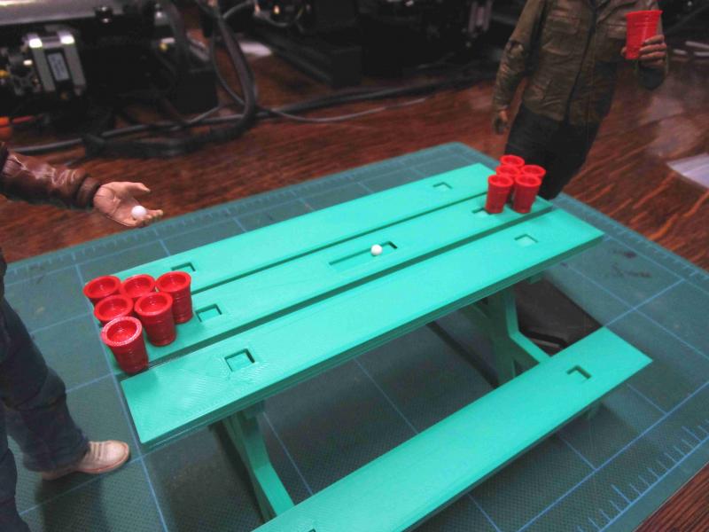 picnic table and cups as part of the beer pong edition of the park kit, not show is grill and cooler