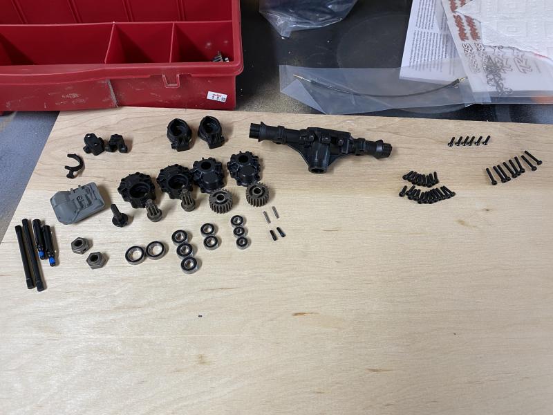 Rear axle parts laid out for assembly