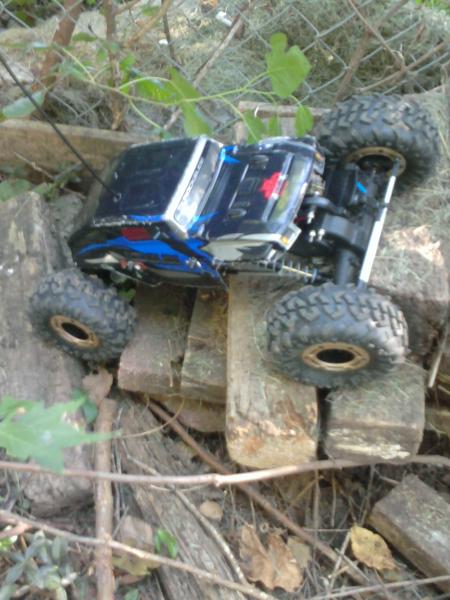 rs10 getting stuck on small wood pile.  cant wait for new tires to get here