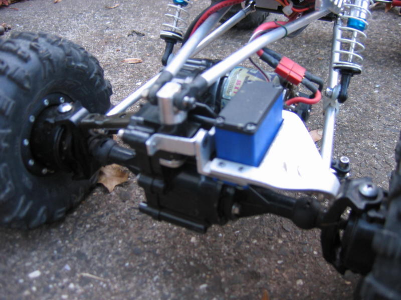 Steering servo mount-- again, sorry for the fuzzy pic.  I'm planning on cutting some material out of the center of the servo brace/axle truss. It just