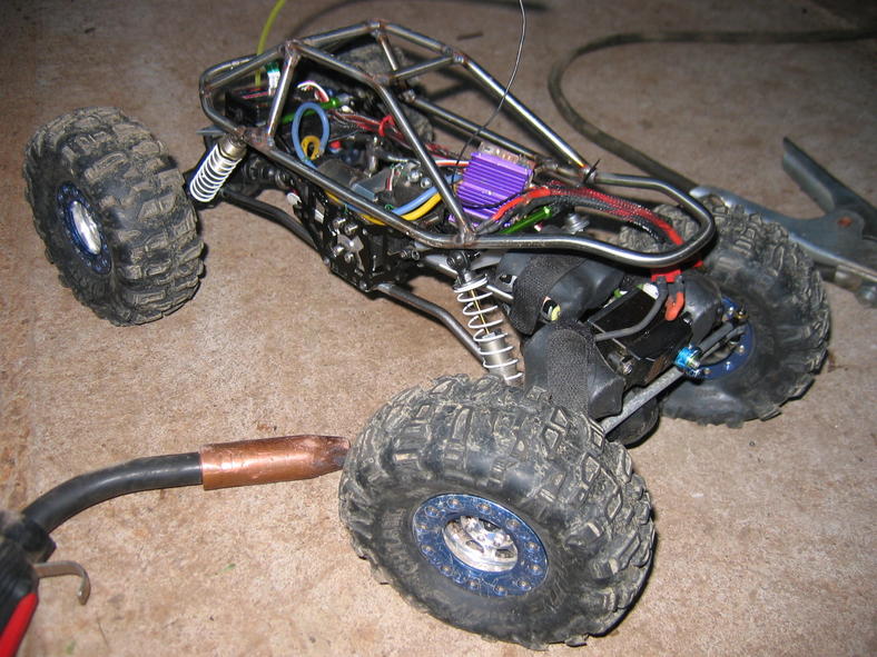 Tack-welding the cage together-- yes-- right on the rig.