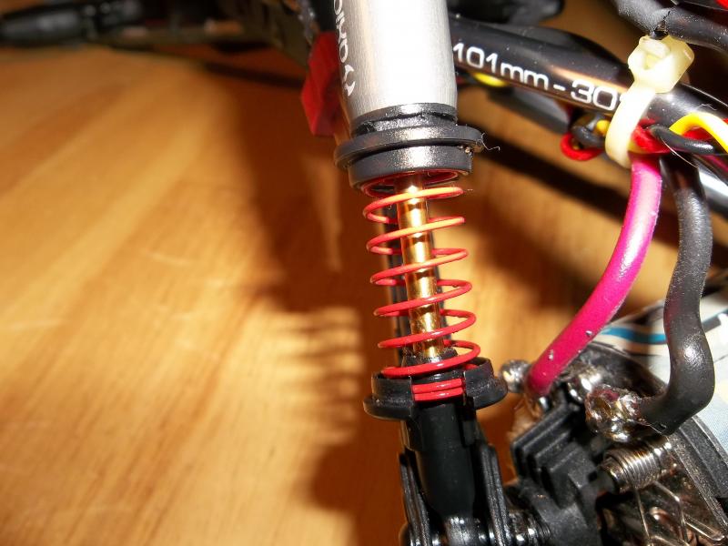 The first thing I changed was mini springs with losi mini cups. You can also see I changed the plastic upper links to aluminum links. Well actually th