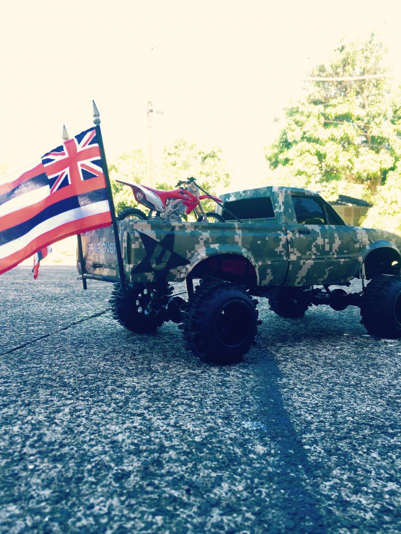 This was for a Big annual truck cruise so I had a couple Hawaiian flags and a dirtbike tied down. Also that's a "Udown" clothing brand sticker