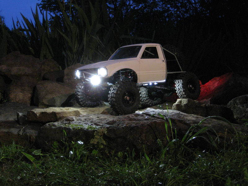 Three rock lights on each side. Two underneath the front bumper, and two beneath the rockers, one pointing back and one forward.